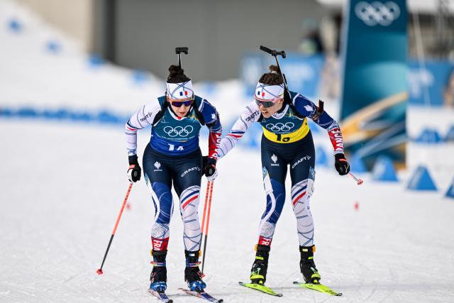 (260218) -- ANTERSELVA, Feb. 18, 2026 (Xinhua) -- Oceane Michelon and Julia Simon of France compete during the biathlon women's 4x6km relay at the 2026 Milan-Cortina Winter Olympics in Anterselva, Italy, Feb. 18, 2026. (Xinhua/Jiang Han)