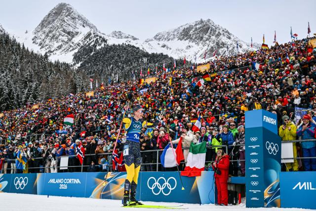 (260218) -- ANTERSELVA, Feb. 18, 2026 (Xinhua) -- Hanna Oeberg of Sweden crosses the finish line during the biathlon women's 4x6km relay at the 2026 Milan-Cortina Winter Olympics in Anterselva, Italy, Feb. 18, 2026. (Xinhua/Jiang Han)