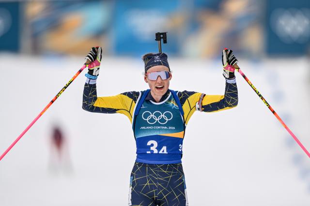 (260218) -- ANTERSELVA, Feb. 18, 2026 (Xinhua) -- Hanna Oeberg of Sweden crosses the finish line during the biathlon women's 4x6km relay at the 2026 Milan-Cortina Winter Olympics in Anterselva, Italy, Feb. 18, 2026. (Xinhua/Jiang Han)