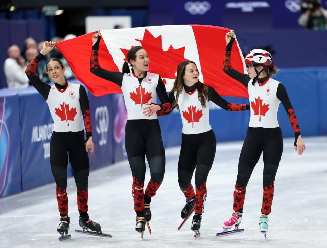 (260218) -- MILAN, Feb. 18, 2026 (Xinhua) -- Players of Canada celebrate after the short track speed skating women's 3000m relay final A at the Milan-Cortina 2026 Olympic Winter Games in Milan, Italy, Feb. 18, 2026. (Xinhua/Li Ming)