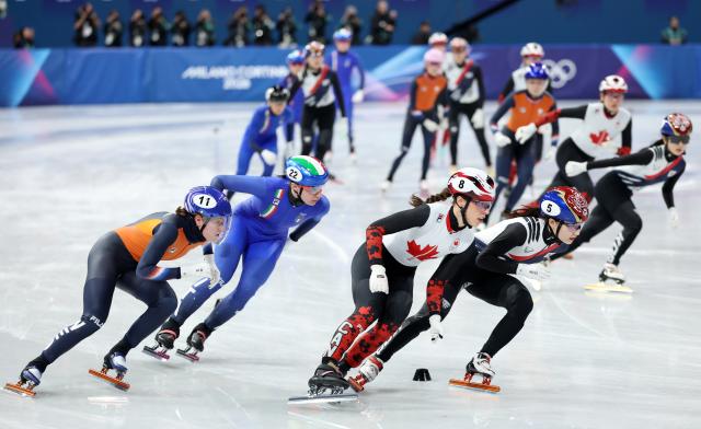 (260218) -- MILAN, Feb. 18, 2026 (Xinhua) -- Athletes compete during the short track speed skating women's 3000m relay final A at the Milan-Cortina 2026 Olympic Winter Games in Milan, Italy, Feb. 18, 2026. (Xinhua/Li Ming)