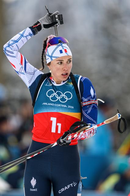 (260219) -- ANTERSELVA, Feb. 19, 2026 (Xinhua) -- Camille Bened of France reacts during the biathlon women's 4x6km relay at the 2026 Milan-Cortina Winter Olympics in Anterselva, Italy, Feb. 18, 2026. (Xinhua/Jiang Han)
