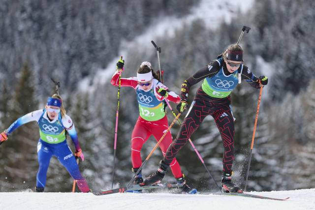 (260219) -- ANTERSELVA, Feb. 19, 2026 (Xinhua) -- Franziska Preuss (R) of Germany, Kamila Zuk (C) of Poland and Paulina Batovska Fialkova of Slovakia compete during the biathlon women's 4x6km relay at the 2026 Milan-Cortina Winter Olympics in Anterselva, Italy, Feb. 18, 2026. (Xinhua/Zhang Tao)