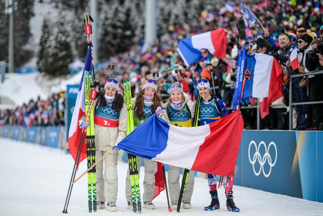 (260219) -- ANTERSELVA, Feb. 19, 2026 (Xinhua) -- Team France celebrate after the biathlon women's 4x6km relay at the 2026 Milan-Cortina Winter Olympics in Anterselva, Italy, Feb. 18, 2026. (Xinhua/Jiang Han)