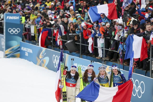 (260219) -- ANTERSELVA, Feb. 19, 2026 (Xinhua) -- Team France celebrate after the biathlon women's 4x6km relay at the 2026 Milan-Cortina Winter Olympics in Anterselva, Italy, Feb. 18, 2026. (Xinhua/Zhang Tao)