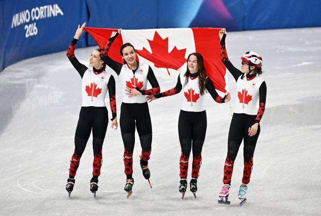 (260219) -- MILAN, Feb. 19, 2026 (Xinhua) -- Players of Canada celebrate after the short track speed skating women's 3000m relay final A at the Milan-Cortina 2026 Olympic Winter Games in Milan, Italy, Feb. 18, 2026. (Xinhua/Cheng Min)