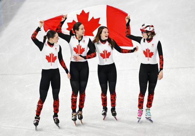 (260219) -- MILAN, Feb. 19, 2026 (Xinhua) -- Players of Canada celebrate after the short track speed skating women's 3000m relay final A at the Milan-Cortina 2026 Olympic Winter Games in Milan, Italy, Feb. 18, 2026. (Xinhua/Cheng Min)