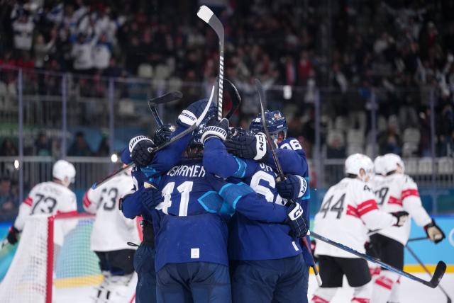 (260219) -- MILAN, Feb. 19, 2026 (Xinhua) -- Finland's players celebrate a goal during the ice hockey men's play-offs quarterfinal between Finland and Switzerland at the Milan-Cortina 2026 Olympic Winter Games in Milan, Italy, Feb. 18, 2026. (Xinhua/Tao Xiyi)
