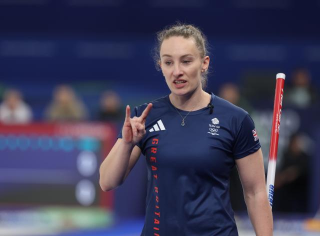 (260219) -- CORTINA D'AMPEZZO, Feb. 19, 2026 (Xinhua) -- Jennifer Dodds of Britain reacts during the curling women's round robin session 11 match between Britain and Japan at the 2026 Milan-Cortina Winter Olympics in Cortina, Italy, Feb. 18, 2026. (Xinhua/Ding Xu)