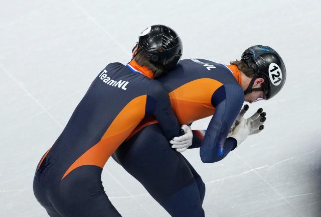 (260219) -- MILAN, Feb. 19, 2026 (Xinhua) -- Melle van't Wout (R) and Jens van't Wout of the Netherlands celebrate after the short track speed skating men's 500m final A at the Milan-Cortina 2026 Olympic Winter Games in Milan, Italy, Feb. 18, 2026. (Xinhua/Xue Yuge)