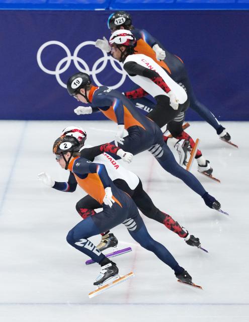 (260219) -- MILAN, Feb. 19, 2026 (Xinhua) -- Athletes start during the short track speed skating men's 500m final A at the Milan-Cortina 2026 Olympic Winter Games in Milan, Italy, Feb. 18, 2026. (Xinhua/Xue Yuge)