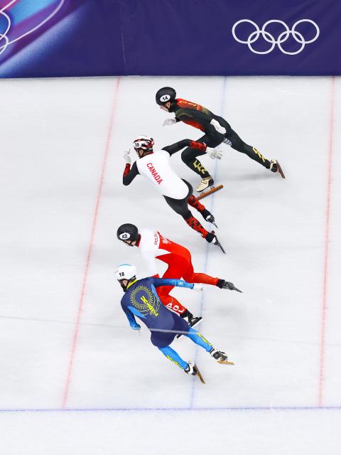 (260219) -- MILAN, Feb. 19, 2026 (Xinhua) -- Liu Shaoang (top) of China starts during the short track speed skating men's 500m final B at the Milan-Cortina 2026 Olympic Winter Games in Milan, Italy, Feb. 18, 2026. (Xinhua/Chen Yichen)