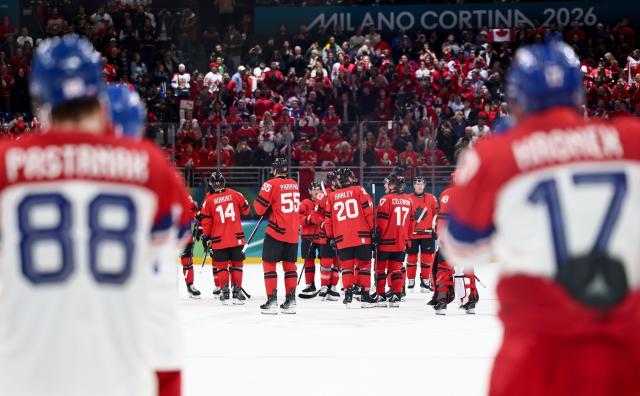 (260219) -- MILAN, Feb. 19, 2026 (Xinhua) -- Players of Canada celebrate after winning the ice hockey men's play-offs quarterfinals match between Canada and the Czech Republic at the Milan-Cortina 2026 Olympic Winter Games in Milan, Italy, Feb. 18, 2026. (Xinhua/Wang Kaiyan)