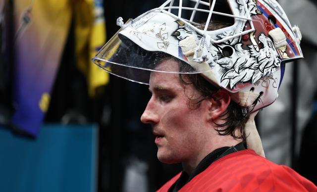 (260219) -- MILAN, Feb. 19, 2026 (Xinhua) -- Lukas Dostal, goalkeeper of the Czech Republic, reacts after the ice hockey men's play-offs quarterfinals match between Canada and the Czech Republic at the Milan-Cortina 2026 Olympic Winter Games in Milan, Italy, Feb. 18, 2026. (Xinhua/Wang Kaiyan)