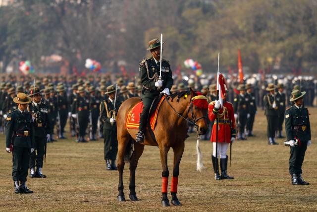 (260219) -- KATHMANDU, Feb. 19, 2026 (Xinhua) -- The Nepalese Army personnel take part in a ceremonial parade during the 76th National Democracy Day celebrations in Kathmandu, Nepal, Feb. 19, 2026. (Photo by Sulav Shrestha/Xinhua)