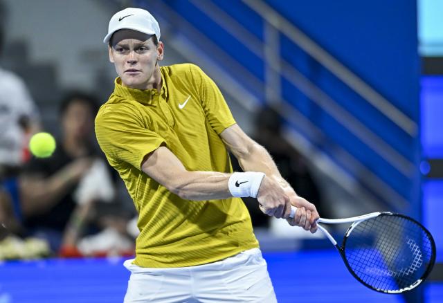 (260219) -- DOHA, Feb. 19, 2026 (Xinhua) -- Jannik Sinner of Italy hits a return during the men's singles round of 16 match between Jannik Sinner of Italy and Alexei Popyrin of Australia at the ATP Qatar Open 2026 tennis tournament in Doha, Qatar, on Feb. 18, 2026. (Photo by Nikku/Xinhua)