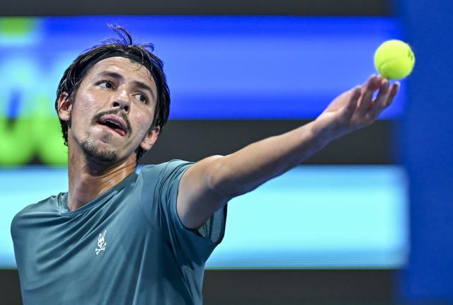 (260219) -- DOHA, Feb. 19, 2026 (Xinhua) -- Alexei Popyrin of Australia serves during the men's singles round of 16 match between Jannik Sinner of Italy and Alexei Popyrin of Australia at the ATP Qatar Open 2026 tennis tournament in Doha, Qatar, on Feb. 18, 2026. (Photo by Nikku/Xinhua)