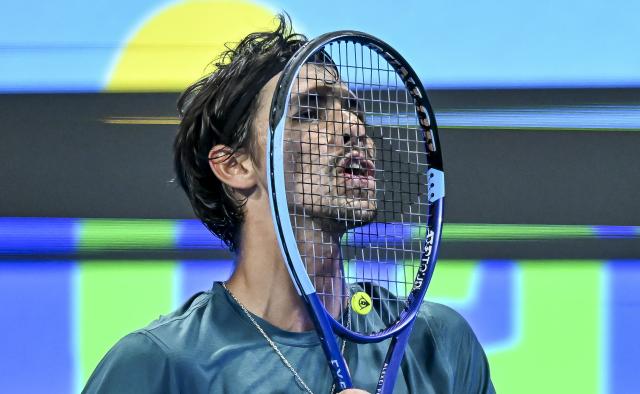 (260219) -- DOHA, Feb. 19, 2026 (Xinhua) -- Alexei Popyrin of Australia reacts during the men's singles round of 16 match between Jannik Sinner of Italy and Alexei Popyrin of Australia at the ATP Qatar Open 2026 tennis tournament in Doha, Qatar, on Feb. 18, 2026. (Photo by Nikku/Xinhua)