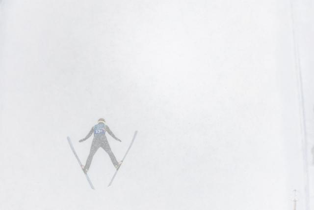 (260219) -- PREDAZZO, Feb. 19, 2026 (Xinhua) -- Vinzenz Geiger of Germany competes during the ski jumping trial round of the nordic combined team sprint at the 2026 Milan-Cortina Winter Olympics in Predazzo, Italy, Feb. 19, 2026. (Xinhua/Huang Wei)