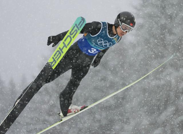 (260219) -- PREDAZZO, Feb. 19, 2026 (Xinhua) -- Zhao Jiawen of China competes during the ski jumping competition round of the nordic combined team sprint at the 2026 Milan-Cortina Winter Olympics in Predazzo, Italy, Feb. 19, 2026. (Xinhua/Meng Yongmin)