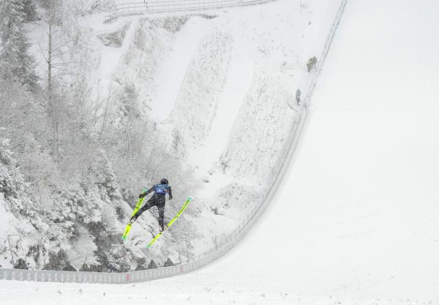 (260219) -- PREDAZZO, Feb. 19, 2026 (Xinhua) -- Zhao Jiawen of China competes during the ski jumping competition round of the nordic combined team sprint at the 2026 Milan-Cortina Winter Olympics in Predazzo, Italy, Feb. 19, 2026. (Xinhua/Meng Yongmin)
