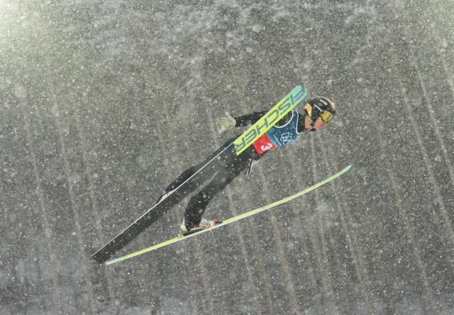 (260219) -- PREDAZZO, Feb. 19, 2026 (Xinhua) -- Zhao Zihe of China competes during the ski jumping trial round of the nordic combined team sprint at the 2026 Milan-Cortina Winter Olympics in Predazzo, Italy, Feb. 19, 2026. (Xinhua/Meng Yongmin)