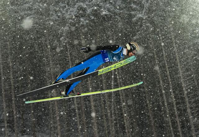 (260219) -- PREDAZZO, Feb. 19, 2026 (Xinhua) -- Ilkka Herola of Finland competes during the ski jumping trial round of the nordic combined team sprint at the 2026 Milan-Cortina Winter Olympics in Predazzo, Italy, Feb. 19, 2026. (Xinhua/Meng Yongmin)