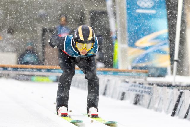(260219) -- PREDAZZO, Feb. 19, 2026 (Xinhua) -- Zhao Zihe of China competes during the ski jumping trial round of the nordic combined team sprint at the 2026 Milan-Cortina Winter Olympics in Predazzo, Italy, Feb. 19, 2026. (Xinhua/Huang Wei)