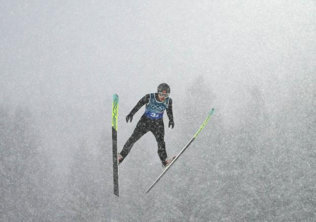 (260219) -- PREDAZZO, Feb. 19, 2026 (Xinhua) -- Zhao Jiawen of China competes during the ski jumping competition round of the nordic combined team sprint at the 2026 Milan-Cortina Winter Olympics in Predazzo, Italy, Feb. 19, 2026. (Xinhua/Meng Yongmin)
