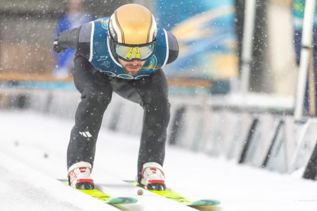 (260219) -- PREDAZZO, Feb. 19, 2026 (Xinhua) -- Johannes Rydzek of Germany competes during the ski jumping trial round of the nordic combined team sprint at the 2026 Milan-Cortina Winter Olympics in Predazzo, Italy, Feb. 19, 2026. (Xinhua/Huang Wei)