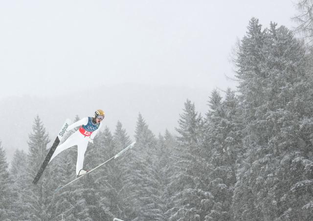 (260219) -- PREDAZZO, Feb. 19, 2026 (Xinhua) -- Andreas Skoglund of Norway competes during the ski jumping trial round of the nordic combined team sprint at the 2026 Milan-Cortina Winter Olympics in Predazzo, Italy, Feb. 19, 2026. (Xinhua/Meng Yongmin)