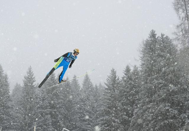 (260219) -- PREDAZZO, Feb. 19, 2026 (Xinhua) -- Ilkka Herola of Finland competes during the ski jumping trial round of the nordic combined team sprint at the 2026 Milan-Cortina Winter Olympics in Predazzo, Italy, Feb. 19, 2026. (Xinhua/Meng Yongmin)
