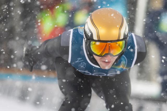 (260219) -- PREDAZZO, Feb. 19, 2026 (Xinhua) -- Vinzenz Geiger of Germany competes during the ski jumping trial round of the nordic combined team sprint at the 2026 Milan-Cortina Winter Olympics in Predazzo, Italy, Feb. 19, 2026. (Xinhua/Huang Wei)