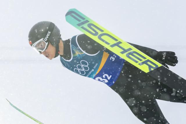 (260219) -- PREDAZZO, Feb. 19, 2026 (Xinhua) -- Zhao Jiawen of China competes during the ski jumping competition round of the nordic combined team sprint at the 2026 Milan-Cortina Winter Olympics in Predazzo, Italy, Feb. 19, 2026. (Xinhua/Huang Wei)