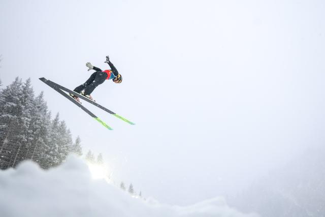 (260219) -- PREDAZZO, Feb. 19, 2026 (Xinhua) -- Zhao Zihe of China competes during the ski jumping competition round of the nordic combined team sprint at the 2026 Milan-Cortina Winter Olympics in Predazzo, Italy, Feb. 19, 2026. (Xinhua/Huang Wei)