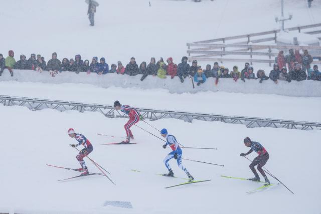 (260219) -- TESERO, Feb. 19, 2026 (Xinhua) -- Athletes compete during the cross-country event of the nordic combined team sprint at the 2026 Milan-Cortina Winter Olympics in Tesero, Italy, Feb. 19, 2026. (Xinhua/Peng Ziyang)