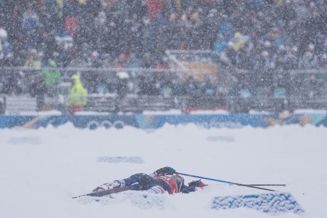 (260219) -- TESERO, Feb. 19, 2026 (Xinhua) -- Marco Heinis of France rests after the cross-country event of the nordic combined team sprint at the 2026 Milan-Cortina Winter Olympics in Tesero, Italy, Feb. 19, 2026. (Xinhua/Peng Ziyang)