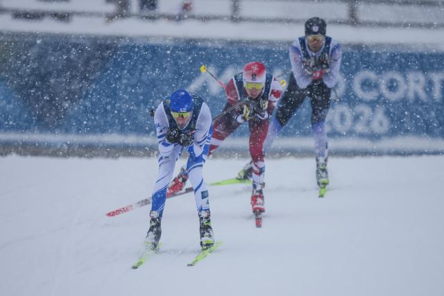 (260219) -- TESERO, Feb. 19, 2026 (Xinhua) -- Ilkka Herola (L) of Finland competes during the cross-country event of the nordic combined team sprint at the 2026 Milan-Cortina Winter Olympics in Tesero, Italy, Feb. 19, 2026. (Xinhua/Peng Ziyang)