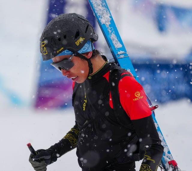(260219) -- BORMIO, Feb. 19, 2026 (Xinhua) -- Bu Luer of China reacts after the ski mountaineering men's sprint event at the Milan-Cortina 2026 Olympic Winter Games in Bormio, Italy, Feb. 19, 2026. (Xinhua/Yan Linyun)