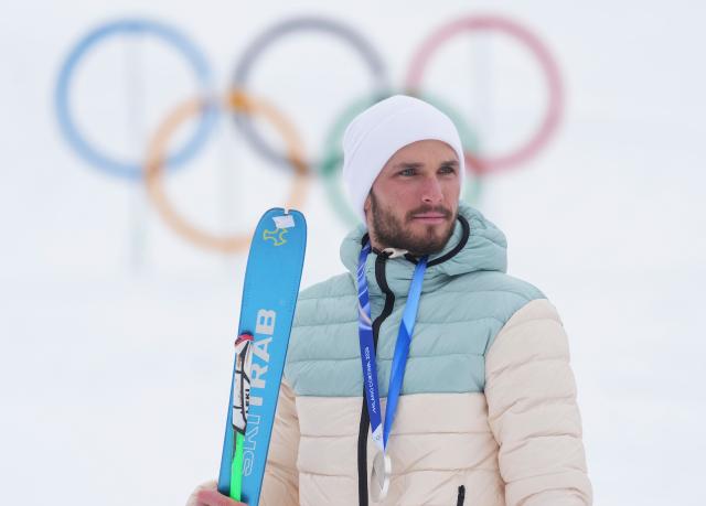(260219) -- BORMIO, Feb. 19, 2026 (Xinhua) -- Silver medalist individual neutral athlete Nikita Filippov reacts during the awarding ceremony of the ski mountaineering men's sprint event at the Milan-Cortina 2026 Olympic Winter Games in Bormio, Italy, Feb. 19, 2026. (Xinhua/Hu Huhu)