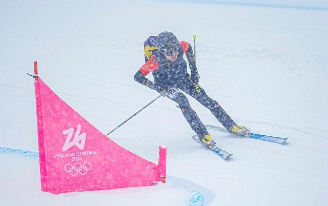 (260219) -- BORMIO, Feb. 19, 2026 (Xinhua) -- Bu Luer of China competes during the ski mountaineering men's sprint event at the Milan-Cortina 2026 Olympic Winter Games in Bormio, Italy, Feb. 19, 2026. (Xinhua/Yan Linyun)