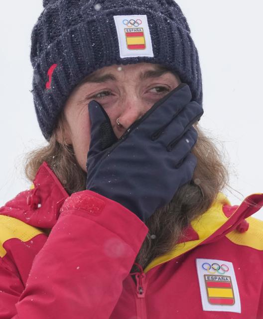 (260219) -- BORMIO, Feb. 19, 2026 (Xinhua) -- Bronze medalist Ana Alonso Rodriguez of Spain reacts during the awarding ceremony of the ski mountaineering women's sprint event at the Milan-Cortina 2026 Olympic Winter Games in Bormio, Italy, Feb. 19, 2026. (Xinhua/Hu Huhu)