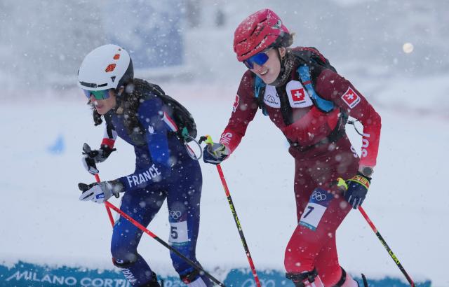 (260219) -- BORMIO, Feb. 19, 2026 (Xinhua) -- Caroline Ulrich of Switzerland and Margot Ravinel of France compete during the ski mountaineering women's sprint event at the Milan-Cortina 2026 Olympic Winter Games in Bormio, Italy, Feb. 19, 2026. (Xinhua/Hu Huhu)