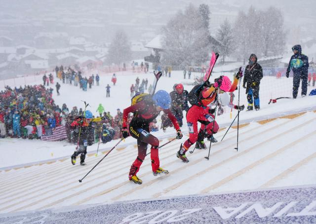 (260219) -- BORMIO, Feb. 19, 2026 (Xinhua) -- Cidan Yuzhen (1st L, front) of China competes during the ski mountaineering women's sprint event at the Milan-Cortina 2026 Olympic Winter Games in Bormio, Italy, Feb. 19, 2026. (Xinhua/Hu Huhu)