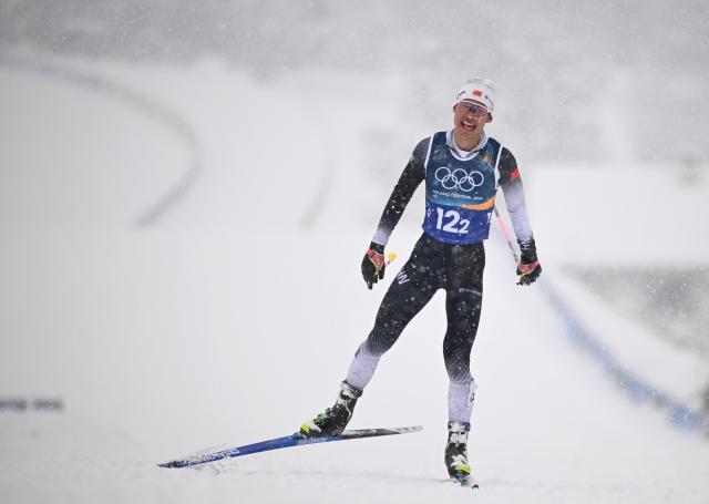 (260219) -- TESERO, Feb. 19, 2026 (Xinhua) -- Zhao Jiawen of China competes during the cross-country event of the nordic combined team sprint at the 2026 Milan-Cortina Winter Olympics in Tesero, Italy, Feb. 19, 2026. (Xinhua/He Canling)