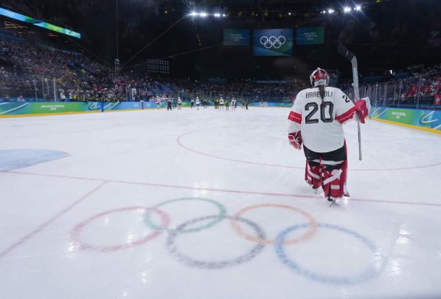 (260219) -- MILAN, Feb. 19, 2026 (Xinhua) -- Goalkeeper Andrea Braendli of Switzerland reacts during the ice hockey women's bronze medal game between Switzerland and Sweden at the Milan-Cortina 2026 Olympic Winter Games in Milan, Italy, Feb. 19, 2026. (Xinhua/Tao Xiyi)