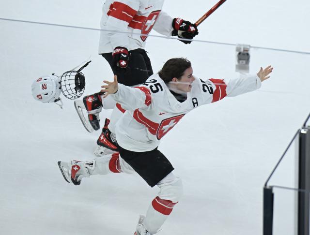 (260219) -- MILAN, Feb. 19, 2026 (Xinhua) -- Alina Muller of Switzerland celebrates victory during the ice hockey women's bronze medal game between Switzerland and Sweden at the Milan-Cortina 2026 Olympic Winter Games in Milan, Italy, Feb. 19, 2026. (Xinhua/Zhang Haofu)