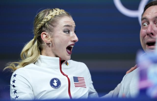 (260219) -- MILAN, Feb. 19, 2026 (Xinhua) -- Amber Glenn of the United States reacts after the free skating match of figure skating women single skating at the Milan-Cortina 2026 Olympic Winter Games in Milan, Italy, Feb. 19, 2026. (Xinhua/Xue Yuge)
