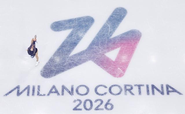 (260219) -- MILAN, Feb. 19, 2026 (Xinhua) -- Amber Glenn of the United States competes during the free skating match of figure skating women single skating at the Milan-Cortina 2026 Olympic Winter Games in Milan, Italy, Feb. 19, 2026. (Xinhua/Li Ming)