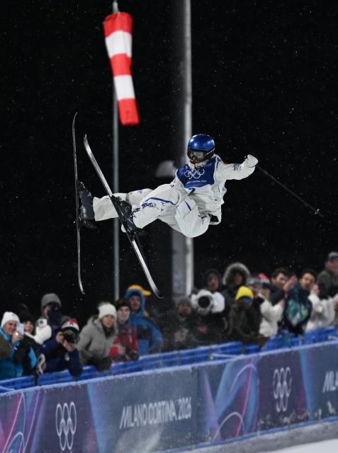 (260219) -- LIVIGNO, Feb. 19, 2026 (Xinhua) -- Gu Ailing of China competes during the qualification of freestyle skiing women's freeski halfpipe at the Milan-Cortina 2026 Olympic Winter Games in Livigno, Italy, Feb. 19, 2026. (Xinhua/Wu Huiwo)